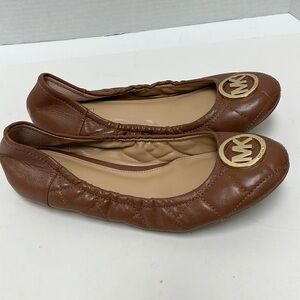 Michael Kors flats.